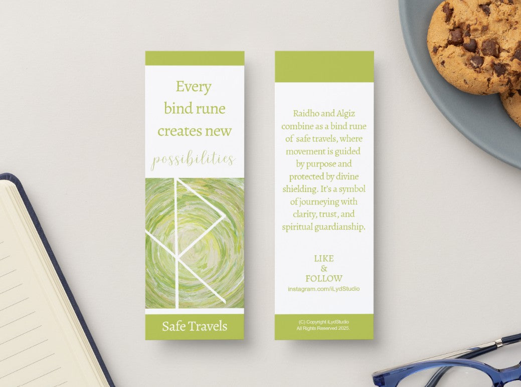 Two green and white bookmarks with text on a surface with a plate of cookies and glasses.